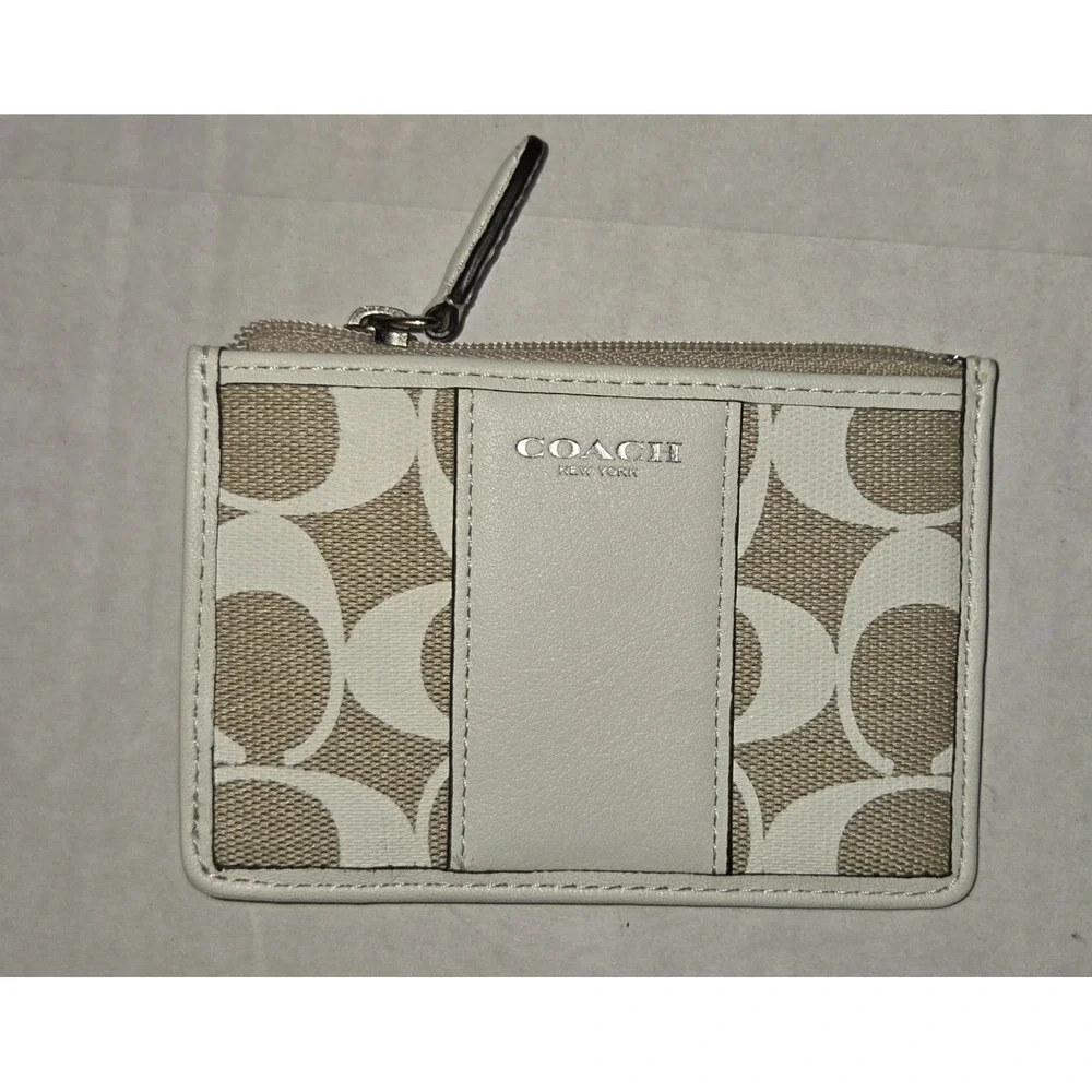 NWT Legacy Print Signature Mini SkinnyID Case. Ivory Khaki. 2013 Line